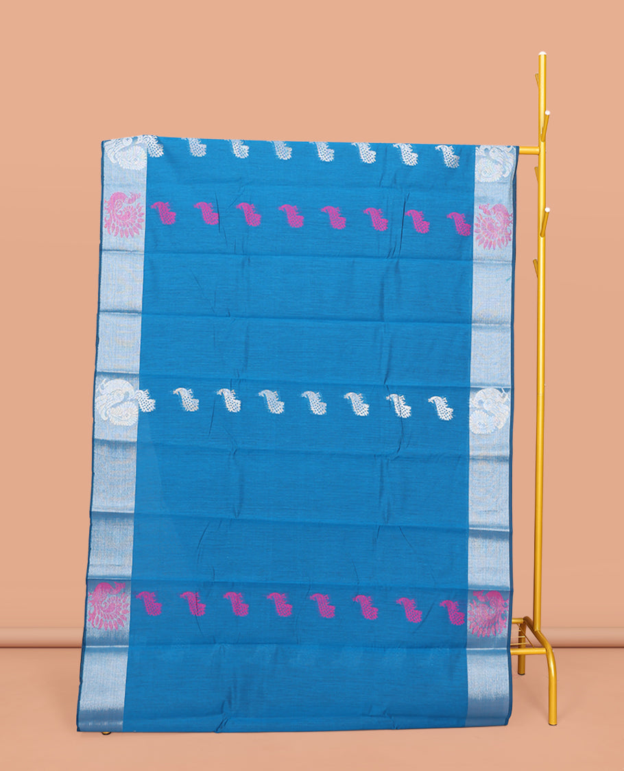 Blue Semi-Silk Cotton Saree, Adorned with Peacock Buttas All Over Its Body, Highlighted by a Self-Border of Peacocks, Pallu Steeped with Peacock Designs, and Paired with a Matching Blouse