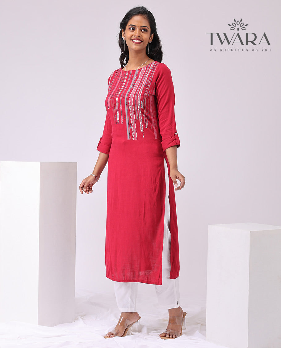 Twara red intricate embroidered round neck , 3/4 th sleeve , below knee leght straight cut kurti