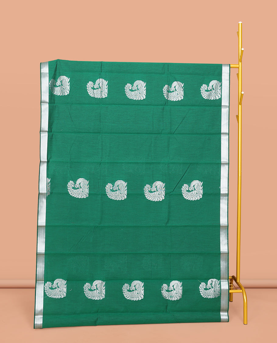 Green Semi-Silk Cotton Saree, Mesmerized with Peacock Buttas All Over Its Body, Highlighted by a Zari Border, Pallu Artfully Woven with Peacock Designs, and Paired with a Matching Blouse