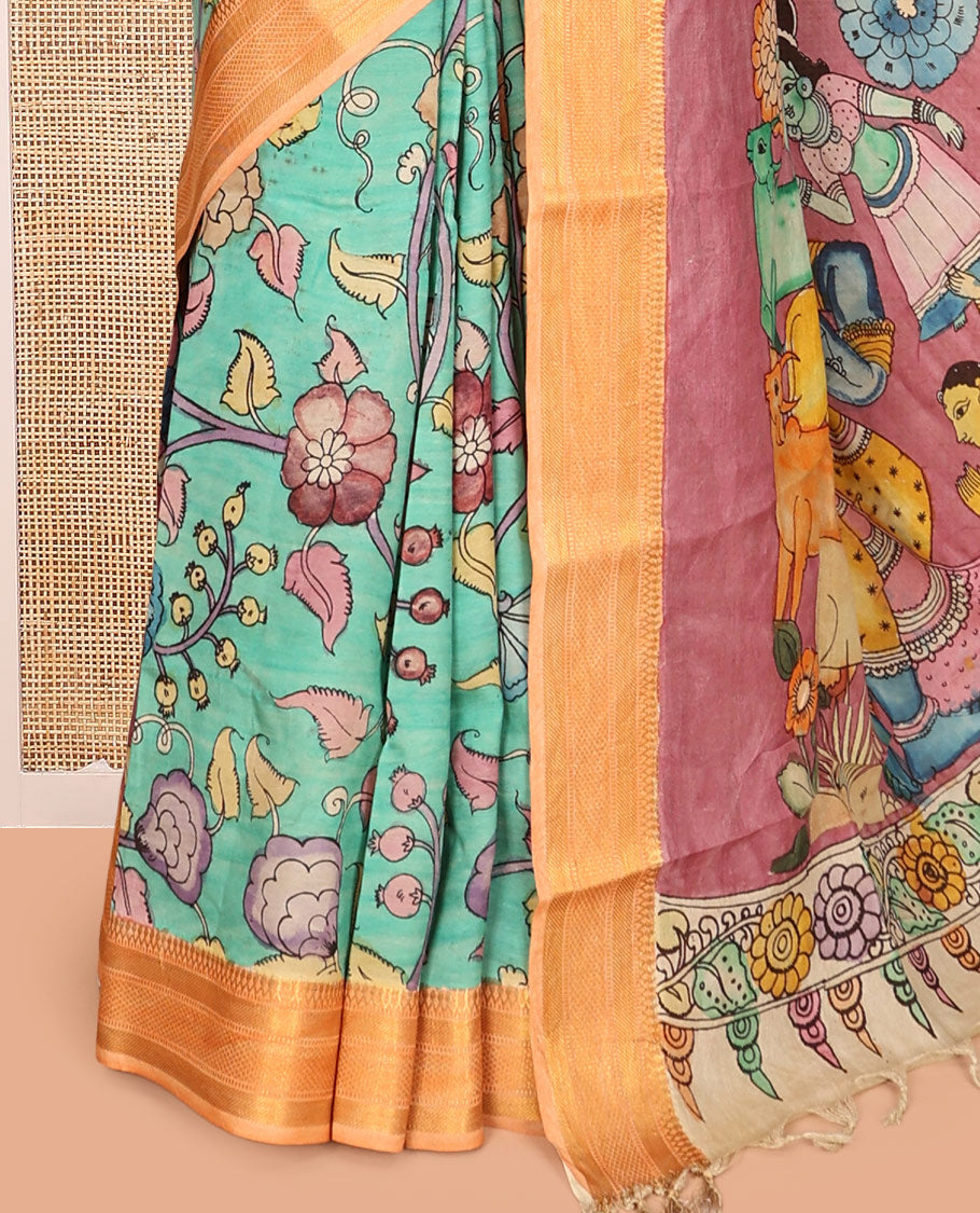 Green Kalamkari Silk Saree, Mesmerized with Human Figurines, a Contrast Traditional Zari Border, Kalamkari Pallu, and a Contrast Blouse
