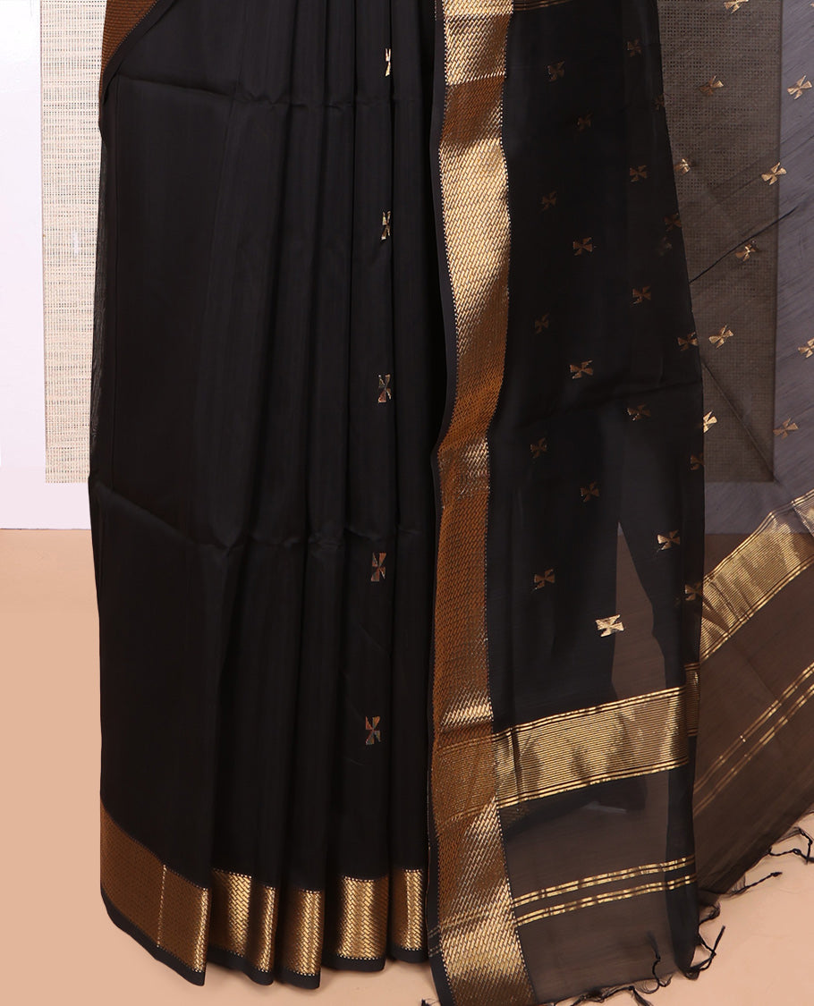 Black Maheshwari Cotton Saree, Accentuated with Buttas, Highlighted by a Traditional Zari Border, Pallu Gleamed Up with Zari Buttas, and a Matching Blouse