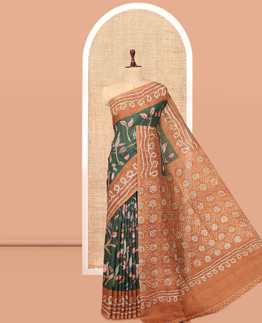 Green Fancy Tussar Saree Features Kalamkari Floral and Animal Print, Contrast Bandhani Border, Bandhani Pallu, and a Contrast Blouse