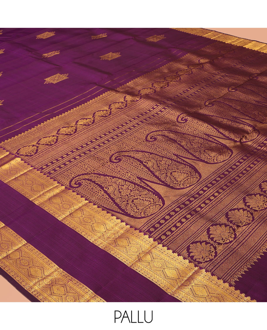 Purple Kanchipuram Silk Saree, Accentuated with Zari Buttas, Highlighted by Zari Rettai Pettu Border of Thazampoo Rekku, Muthu, Poun, and Diamond Designs, Manga Pallu, and Matching Blouse