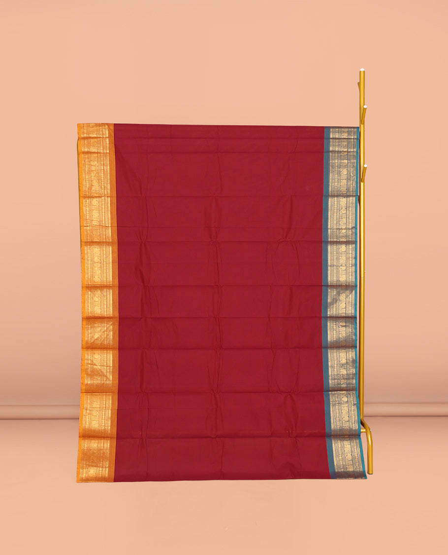 Red Plain Chettinad Cotton Saree, Complemented by a Contrast Traditional Zari Design Woven Ganga-Jamuna Border, Pallu of Stripes, and Paired with a Matching Blouse