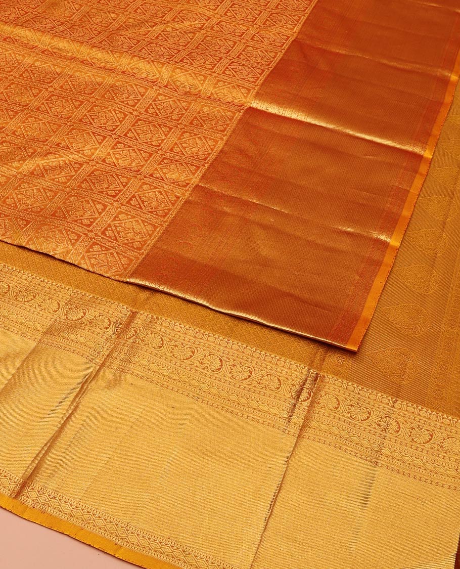 Gold Kanchipuram Wedding Silk Saree, Richly Detailed with Jacquard Design On Its Body, Highlighted by Zari Border of Rekku, Poun, Kodi Visiry, and Diamond Designs, Grand Jaal Pallu and Paired with a Matching Blouse