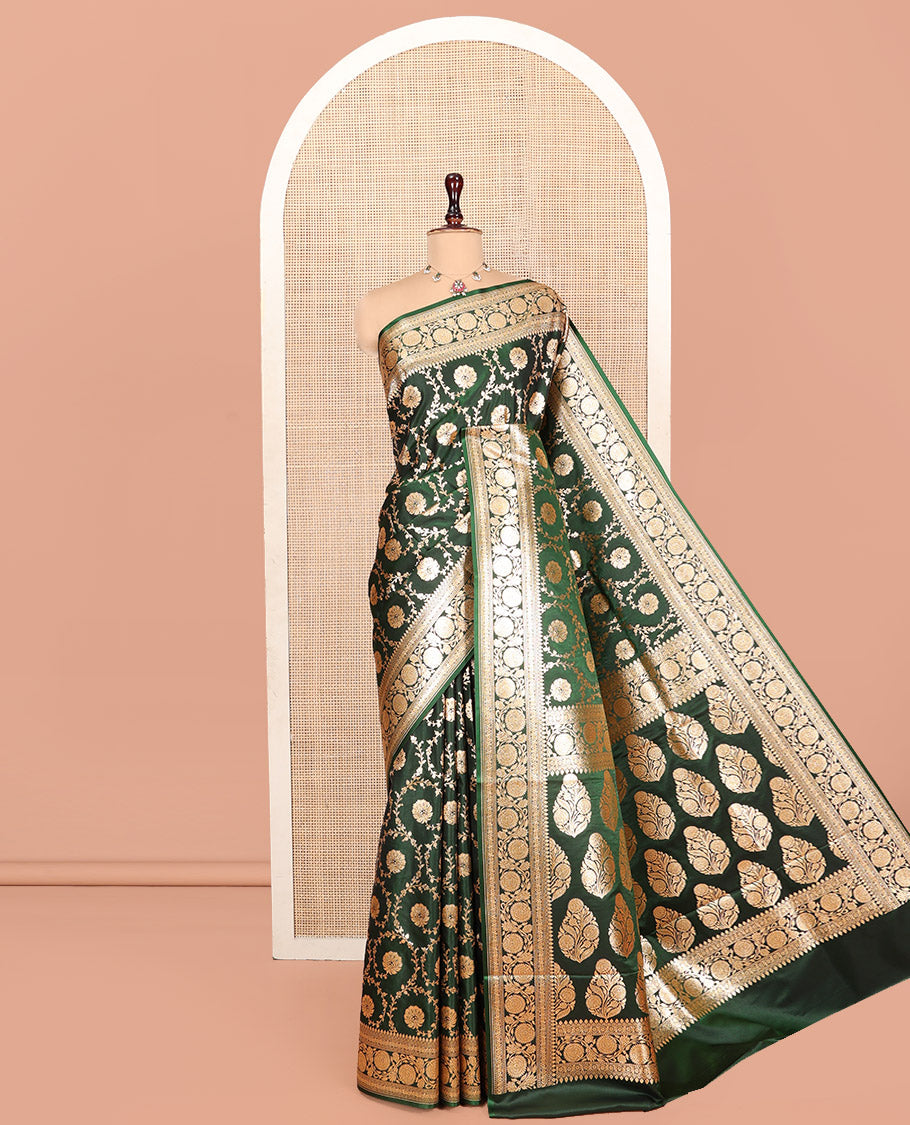 Green Banarasi Nylon Saree, Gleamed Up with Floral Jaal Jacquard, Highlighted by Traditional Zari Border, Intricate Pallu, and a Matching Blouse