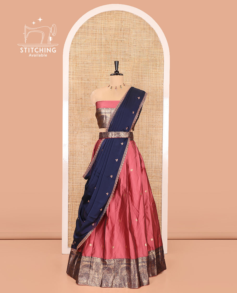 Pink and Blue Semi-Banarasi Half-Saree, Delicately Decked up with Zari Buttas on Its Skirt, Complemented by a Contrast Geometric Patterns Zari Woven Border, Paired with a Matching Blouse, and a Contrast Satin Georgette Embroidered Scallop Dhavani