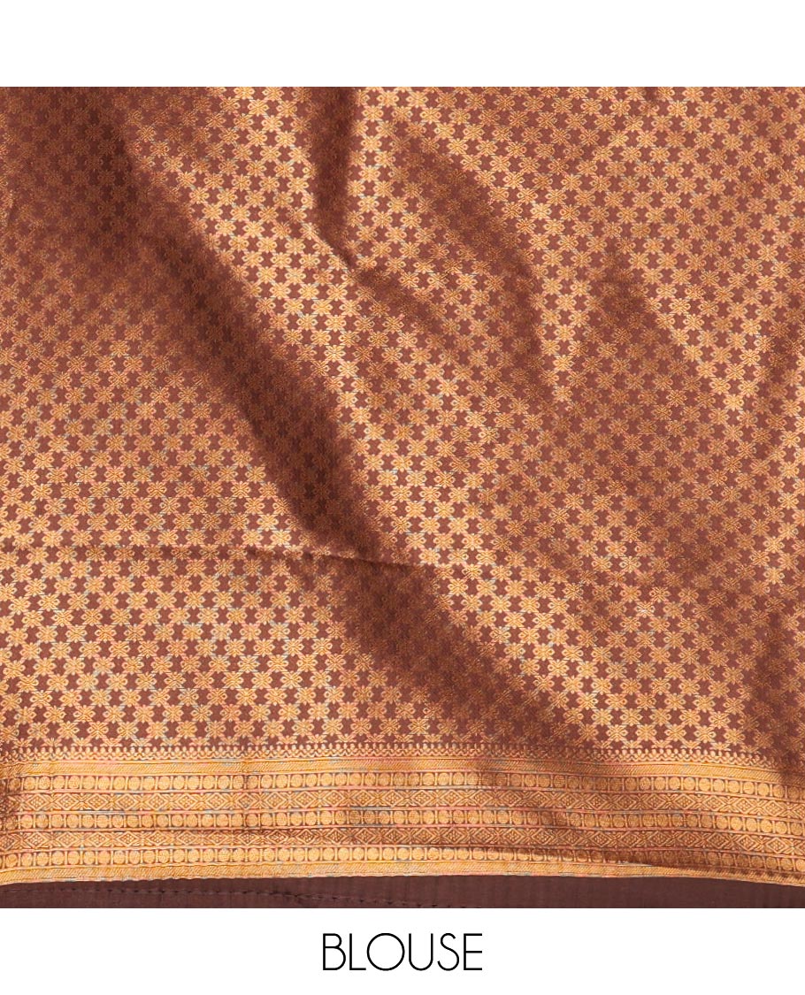 Rust Orange Kanchi Silk Saree, Highlighted with Jacquard Zari Design All Over Its Body, Complemented by a Contrast Rettai Pettu Traditional Zari Border, Opulently Embellished Pallu, and Paired with a Contrast Jacquard Blouse