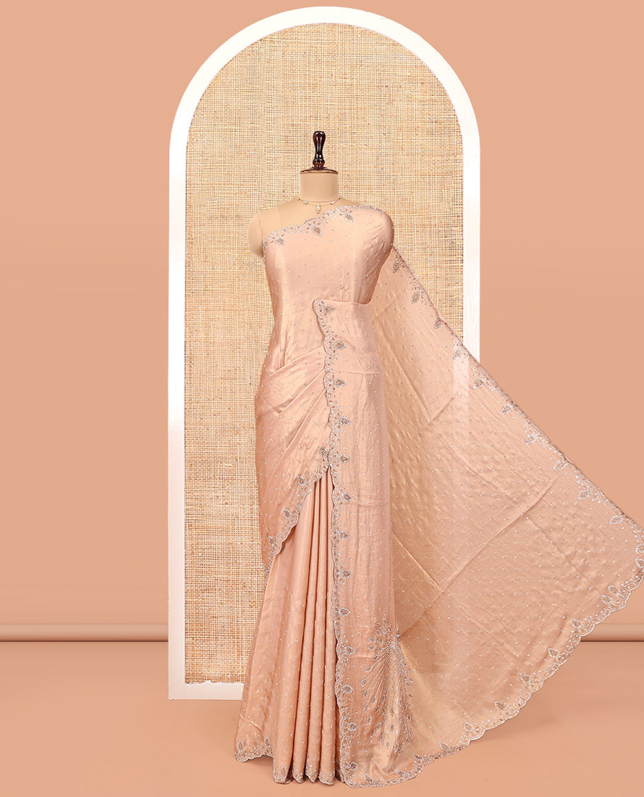 Champagne Designer Saree Gleamed up with Stone Work On Its Body, Scallop Embroidered Border, and Paired with a Heavy Embroidered Matching Blouse