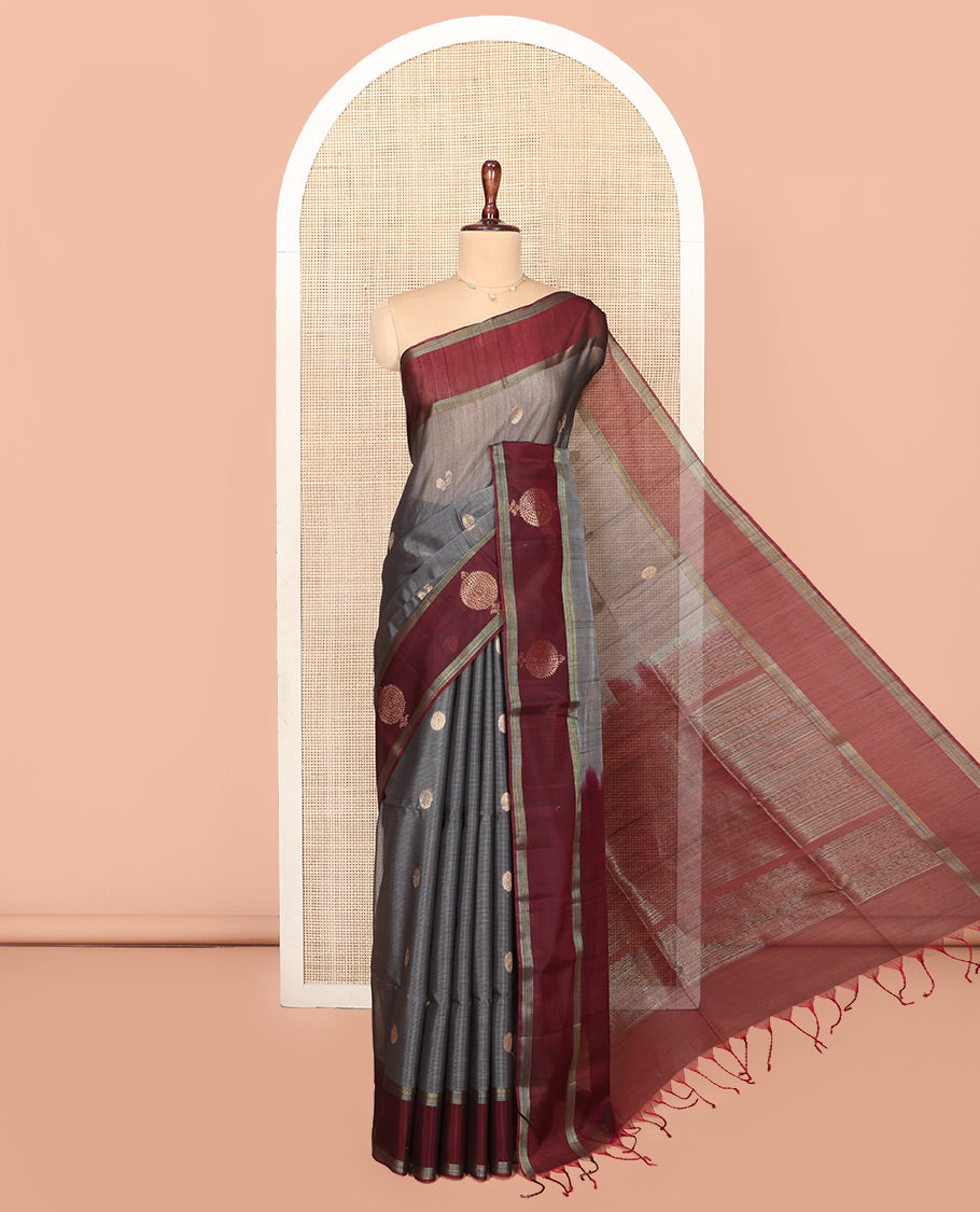 Grey Silk Cotton Saree, Artfully Woven with Peacock and Rudraksham Motifs On Its Body, Complemented by Contrast Zari Motifs Woven Border, Geometric Zari Patterned Pallu and Paired with a Contrast Blouse