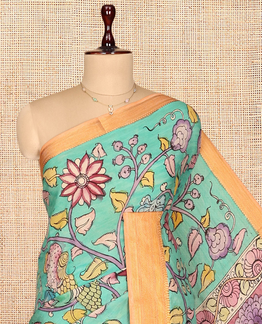 Green Kalamkari Silk Saree, Mesmerized with Human Figurines, a Contrast Traditional Zari Border, Kalamkari Pallu, and a Contrast Blouse