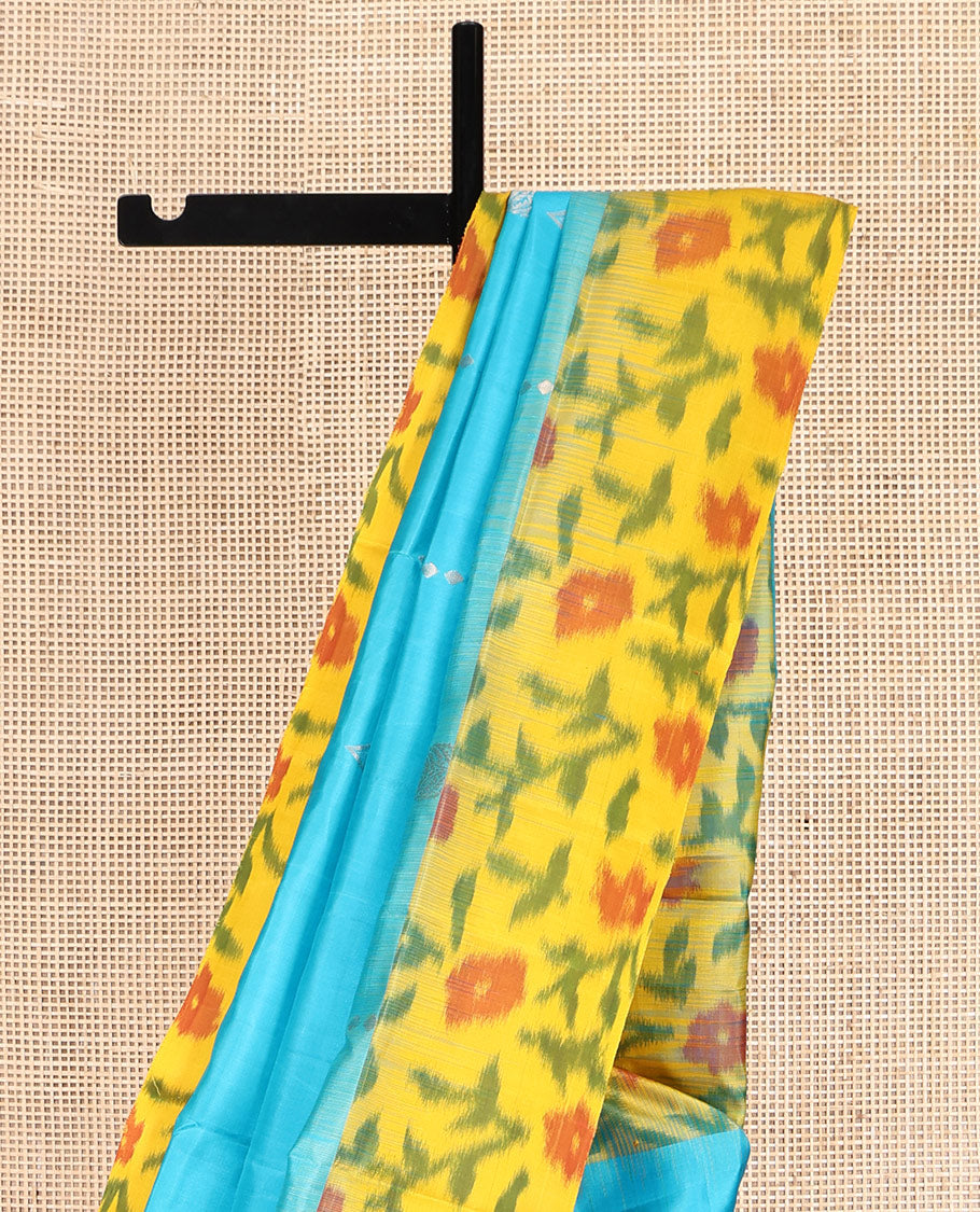 Blue Mayuri Soft Silk Saree, Elevated with Zari Buttas, Contrast Ikat Floral Border, and a Pallu Features Paisleys and a Contrast Blouse
