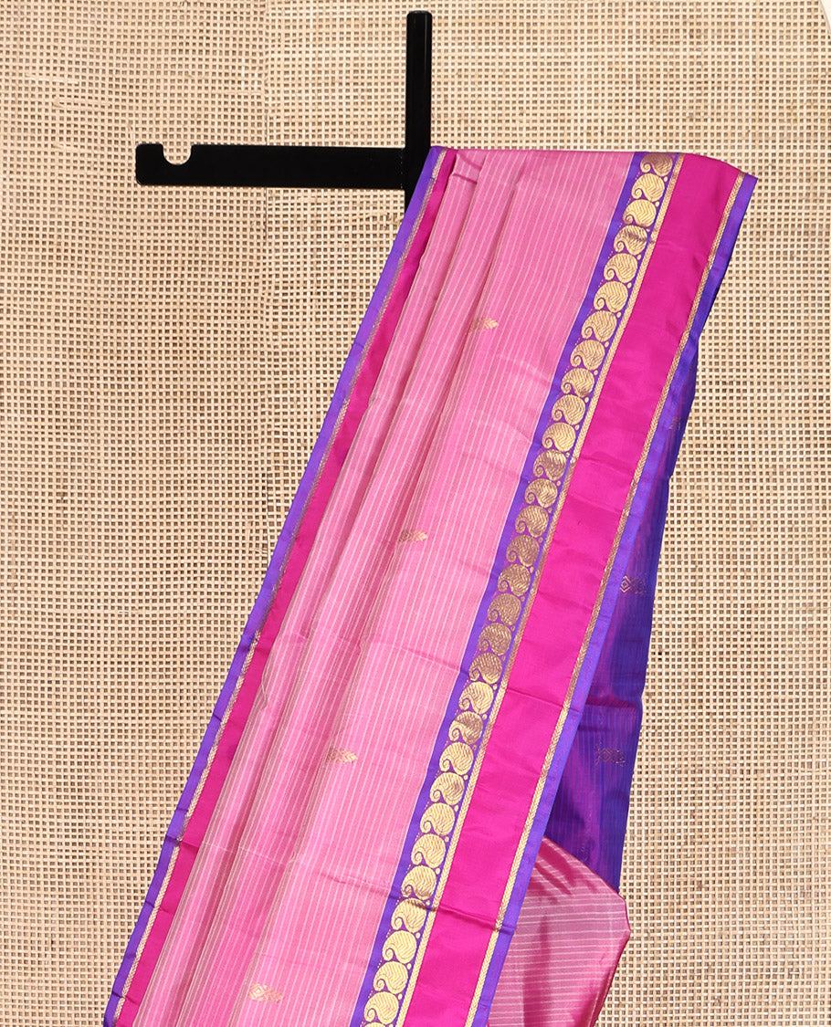 Pink Kanchipuram Silk Saree, Sparsely Woven with Vazhaipoo Stripes and Zari Buttas on Its Body, Complemented by Contrast Rettai Pettu Border of Kathir, and Vanki Manga Designs, Zari-Striped Pallu, and Paired with a Contrast Blouse