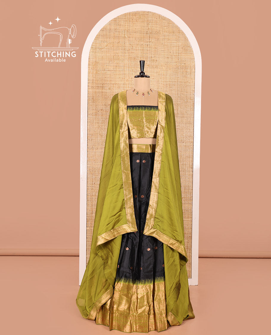 Black and Green Semi-Banaras Half-Saree Featuring Zari Buttas All Over the Skirt, Accentuated with a Contrast Traditional Zari Design Border, Paired with a Matching Blouse, and Has a Plain Syska Georgette Dhavani with a 4-Sided Zari Border