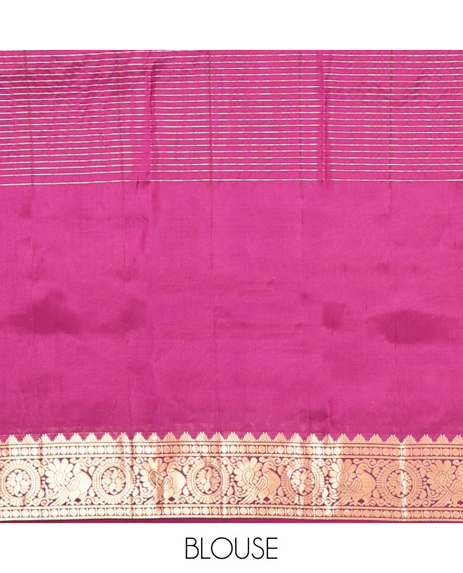 Purple Vasundhara Lite Silk Mix Saree, Artfully Detailed with Mayil-Chakram Buttas and Zari Checks All Over Its Body, Highlighted by a Zari Border of Thazampoo Rekkum, Paisa, Mayil, and Chakram Designs, a Grand Pallu, and Paired with a Matching Blouse