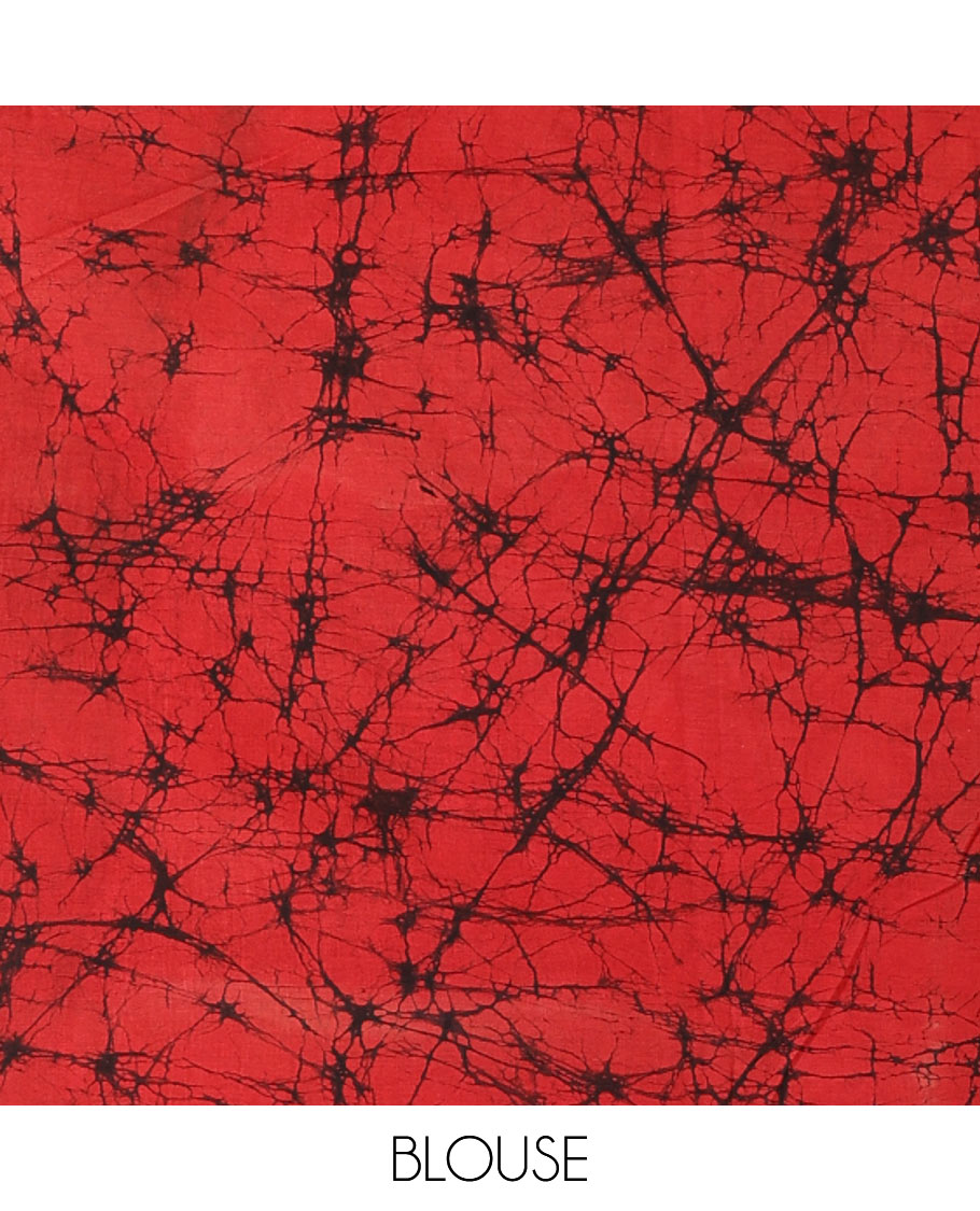 Black vertical stripes printed mul cotton saree, contrast batik printed border, pallu of geometric batik print, and a contrast printed blouse