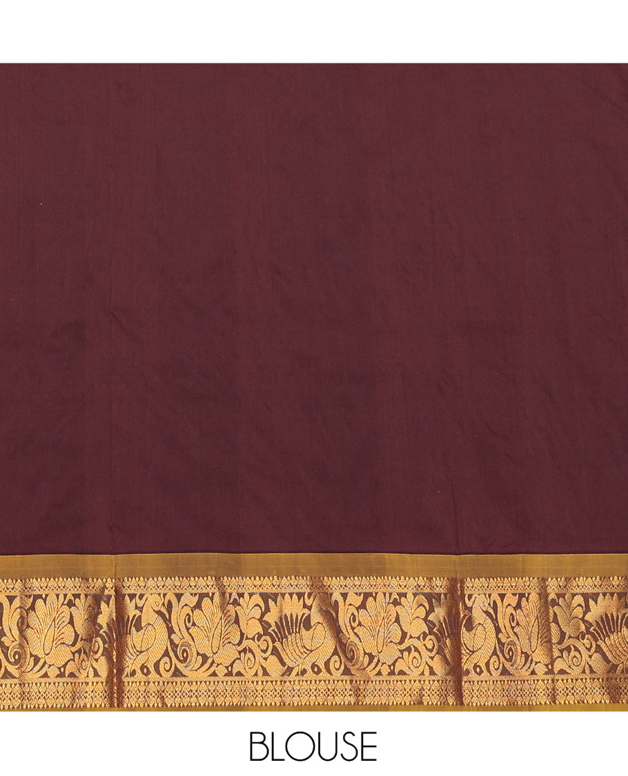 Brown Art Silk Pavadai Material Set, Embellished with Zari Designs on Its Skirt, Complemented by a Contrast Traditional Zari Border, and a Matching Blouse