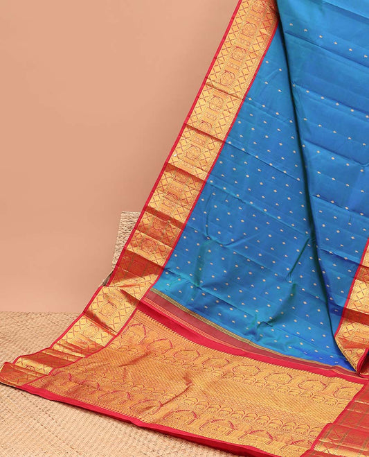 Blue kancheeuram silk saree with contrast korvai zari design border & striped pallu