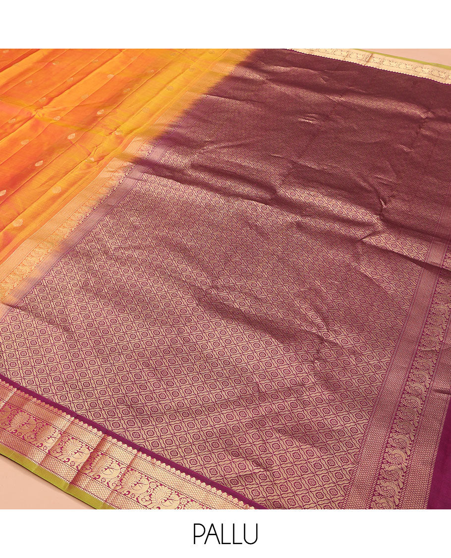 Orange Kanchipuram Silk Saree, Mesmerized with Zari Buttas on Its Body, Complemented by a Contrast Border of Muthu, Mayil Kann, and Mayil Designs, Grand Jaal Pallu, and Paired with a Contrast Blouse