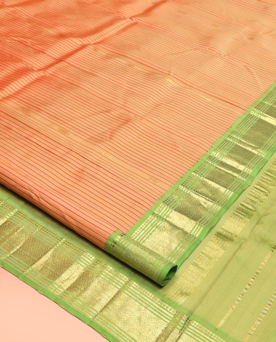 Orange Kanchipuram Silk Saree, Sparsely Threaded with Zari Buttas and Stripes, Contrast Border of Paneer Sombu, Banaras, Muthu, and Jaal, Zari Design Pallu, and No Blouse
