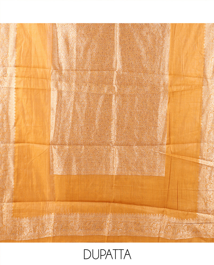 Mustard Banarasi Material Chudidar Features Jacquard Top, a Matching Santoon Bottom, and an Intricately Designed Dupatta