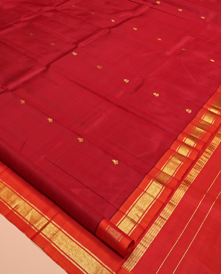 Red Kanchipuram Silk Saree Features Buttas, a Contrast One-Sided Border of Banaras, and Mayil Kann Designs, Zari Design Pallu, and No Blouse