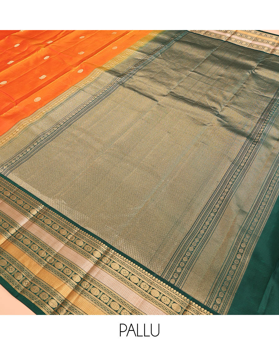 Orange Vasundhara Silk Saree, Woven with Zari Buttas, Contrast Border of Thilakam Mokku, Neli, Muthu, Kuyil Kann, Rudraksham, and Star Vanki, Grand Pallu, and a Contrast Blouse