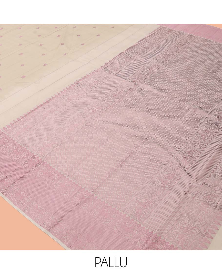 Beige Kanchipuram Silk Saree, Beautifully Bedecked with Thread Buttas, a Self-Border of Thilakam Mokku, Iruthalai Pakshi, and Kuyil Kann, Jaal Pallu, and a Matching Blouse