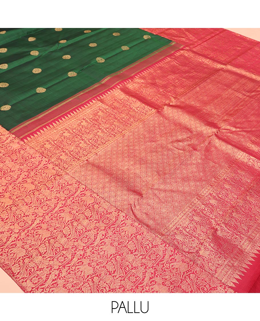 Green Kanchipuram Designer Silk Saree, Entralled with Chakram Buttas All Over Its Body, Complemented by Contrast Historically Woven Border of Yaali and Yaanai Designs, Grand Jaal Pallu and Paired with a Contrast Blouse