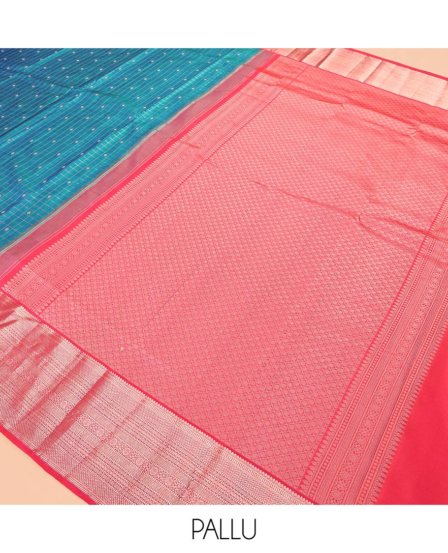 Blue Vasundhara Silk Saree, Featuring Zari Butta Enclosed Checks, a Contrast Border of Thilakam Mokku, Muthu, Mayil Kann, Rettai Neli, and Vanki Designs, Jaal Pallu, and Contrast Blouse