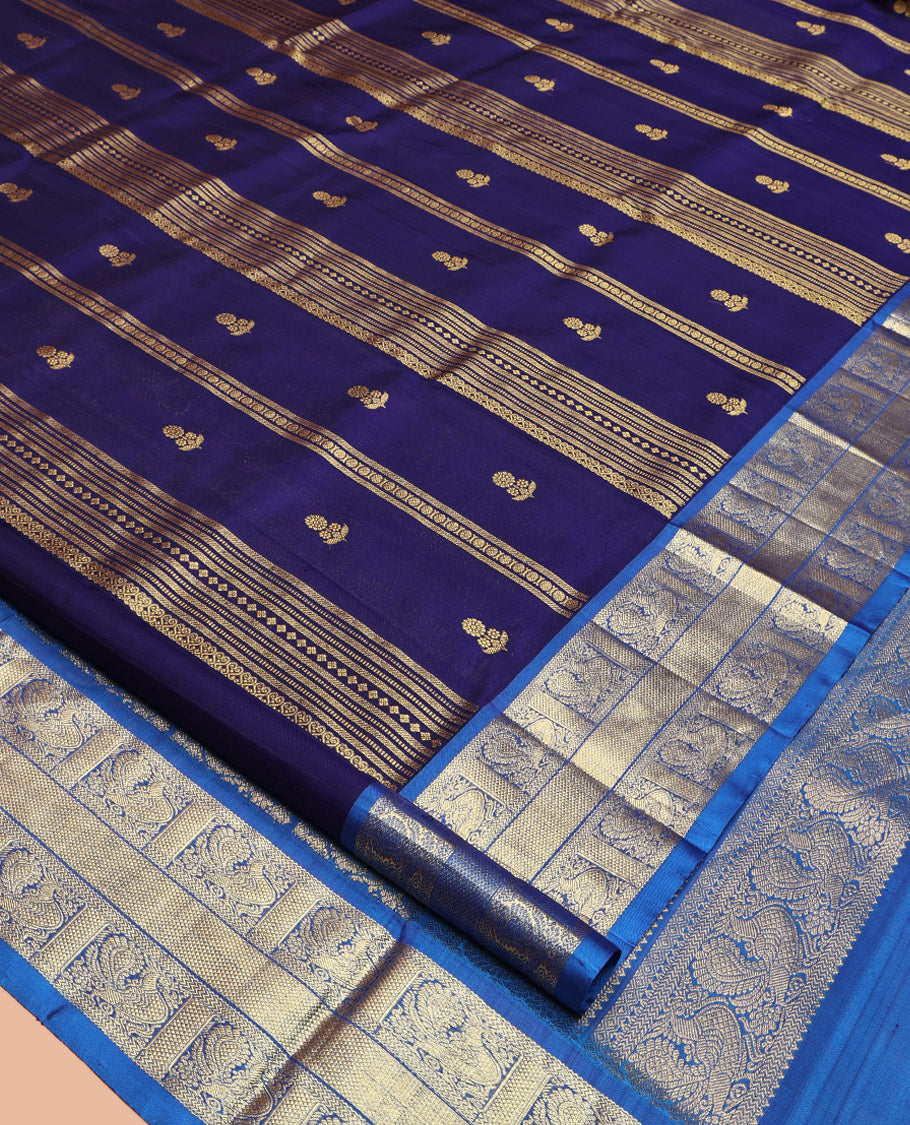 Navy Blue Venkatagiri Silk Saree, Detailed with Zari Designs All Over Its Body, Complemented by a Contrast Traditional Zari Border of Peacock Designs, Pallu of Peacock Designs, and Paired with a Contrast Blouse