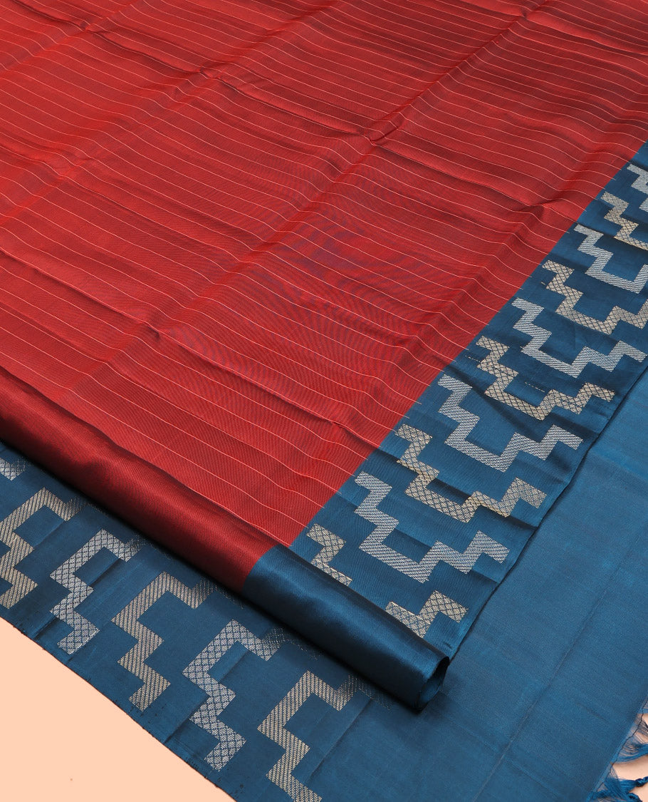 Rust Mayuri Lite Silk Mix Saree, Subtly Sparkled With Stripes, Complemented by Contrast Border, and Pallu of Geometric Patterns, and a Contrast Blouse