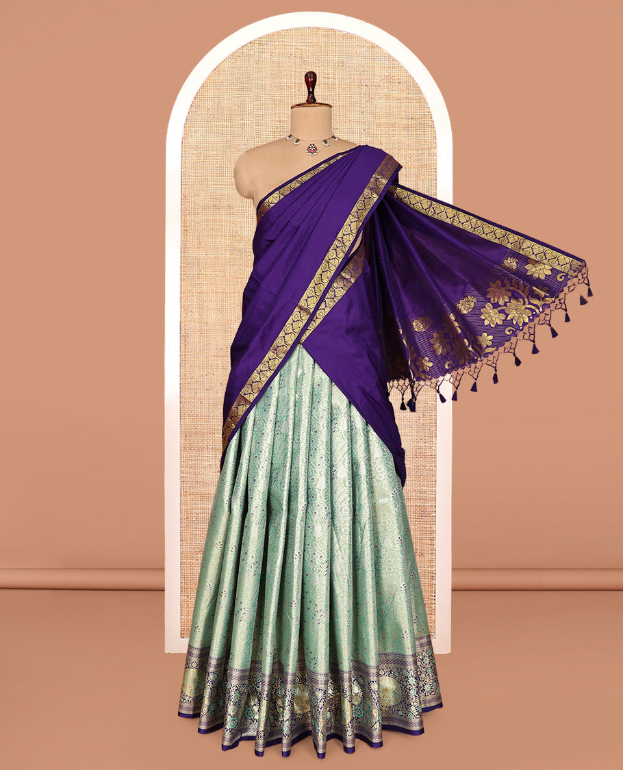 Green Art Silk Half-Saree, Richly Detailed with Jacquard Design, Contrast Intricate Motif Border, Paired with a Contrast Jacquard Blouse, and an Intricate Dhavani