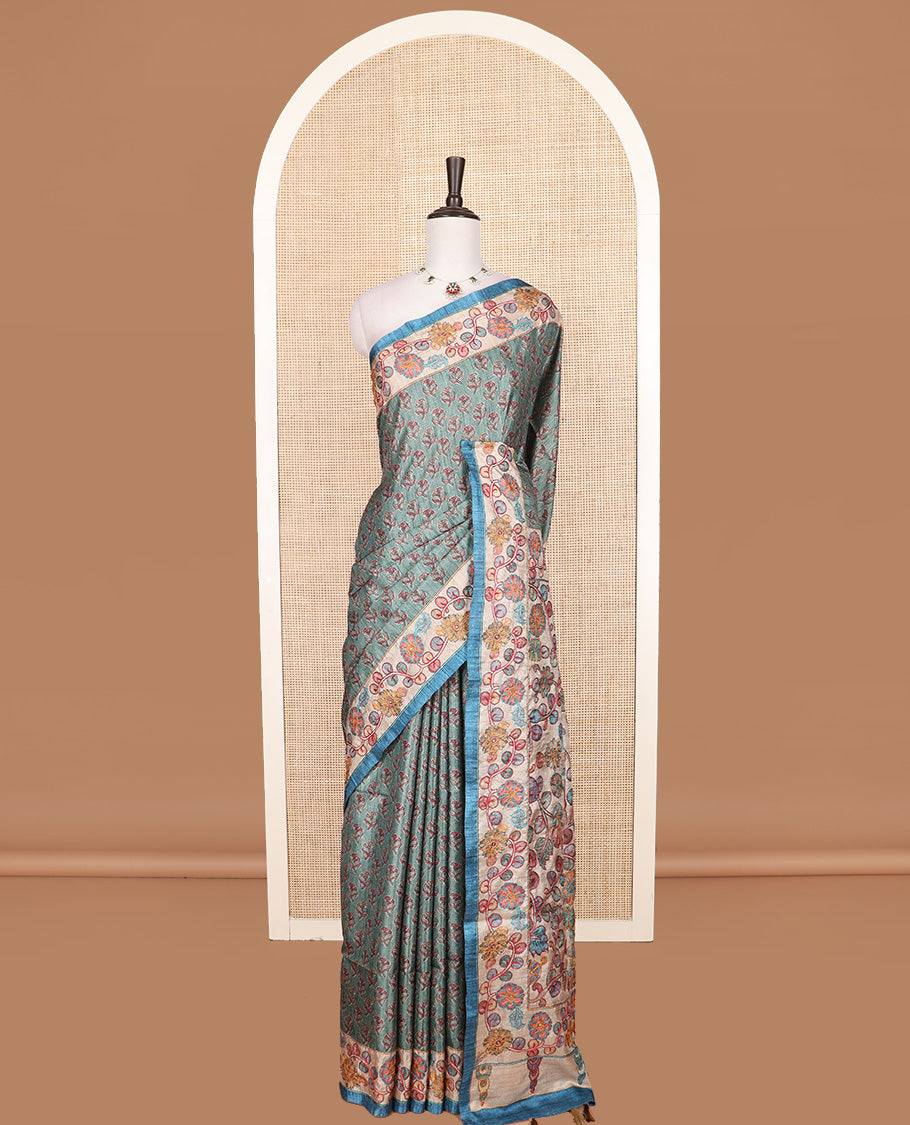 Green floral motifs printed tussar silk saree, contrast border and pallu of floral creeper print and embroidery