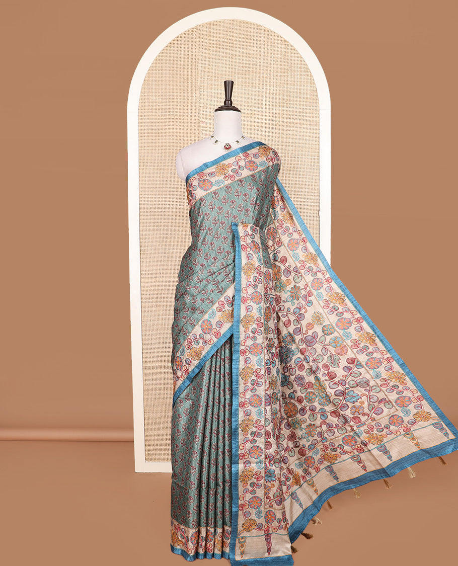 Green floral motifs printed tussar silk saree, contrast border and pallu of floral creeper print and embroidery