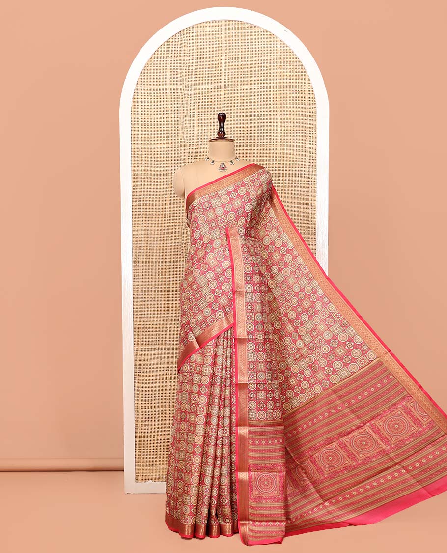 Pink Printed Silk Saree, Gracefully Embellished with Geometric Prints, Highlighted by a Traditional Zari Border, Printed Pallu, and a Matching Blouse