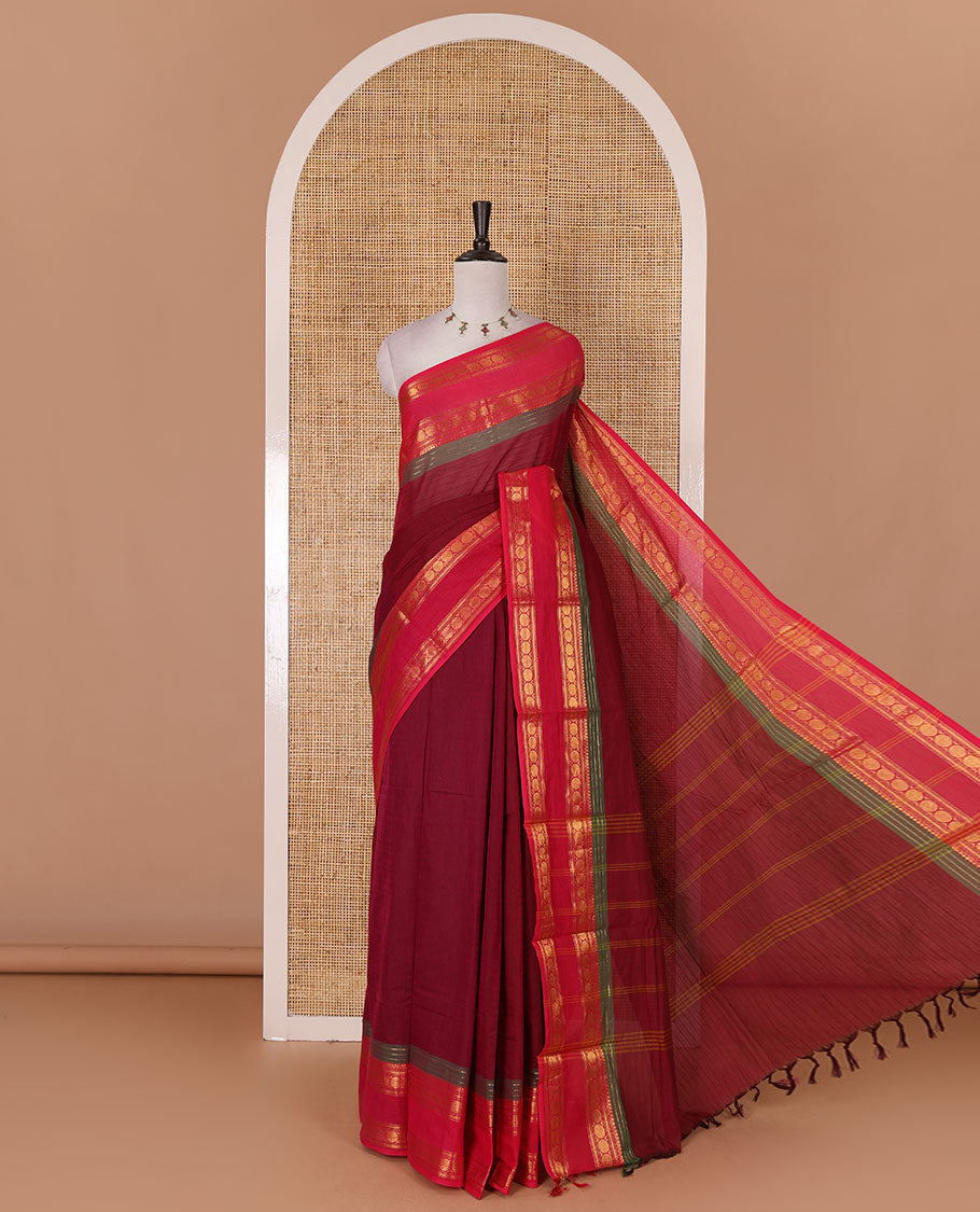 Magenta striped Chettinad cotton saree, contrast rettai rettu rudraksham motif zari border, striped pallu, and matching blouse