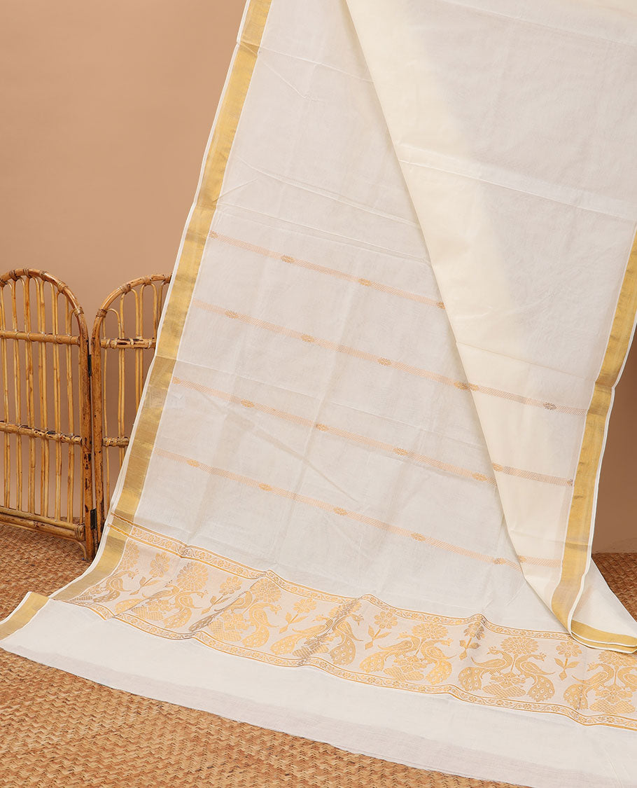 Cream kerala saree with zari designs, zari border & pallu of peacock designs