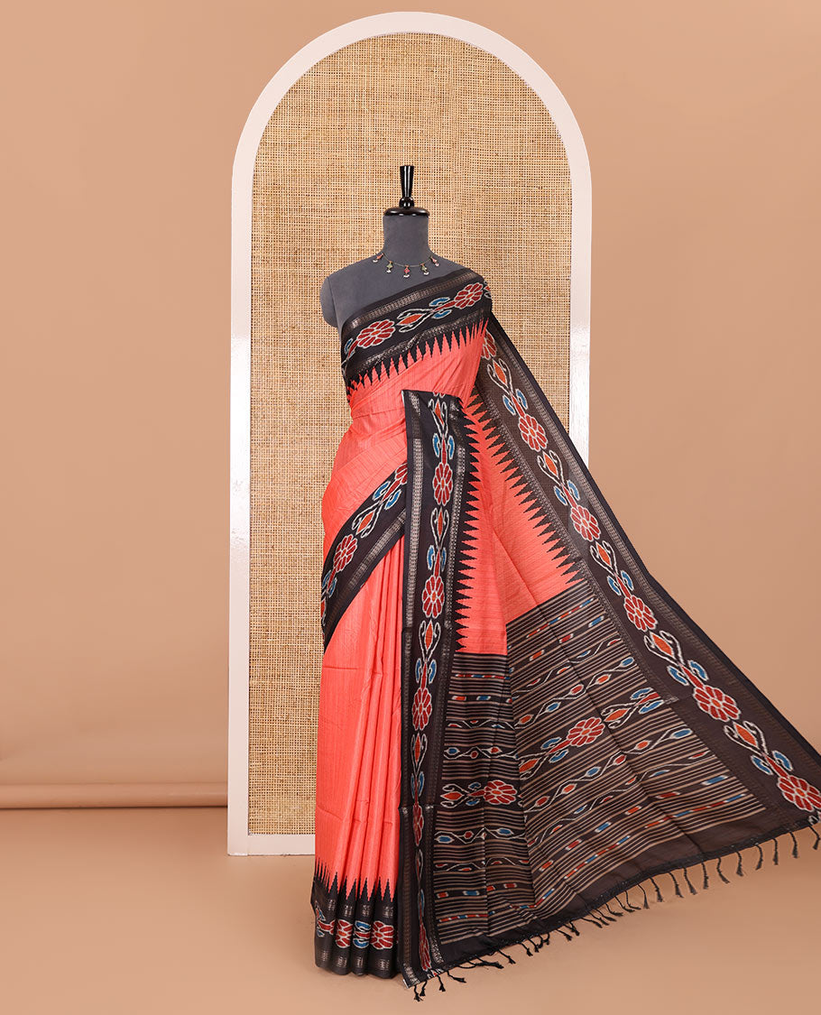 Tomato pink plain Katan silk saree, contrast temple ikkat floral printed border, ikkat floral printed pallu, and ikkat printed blouse