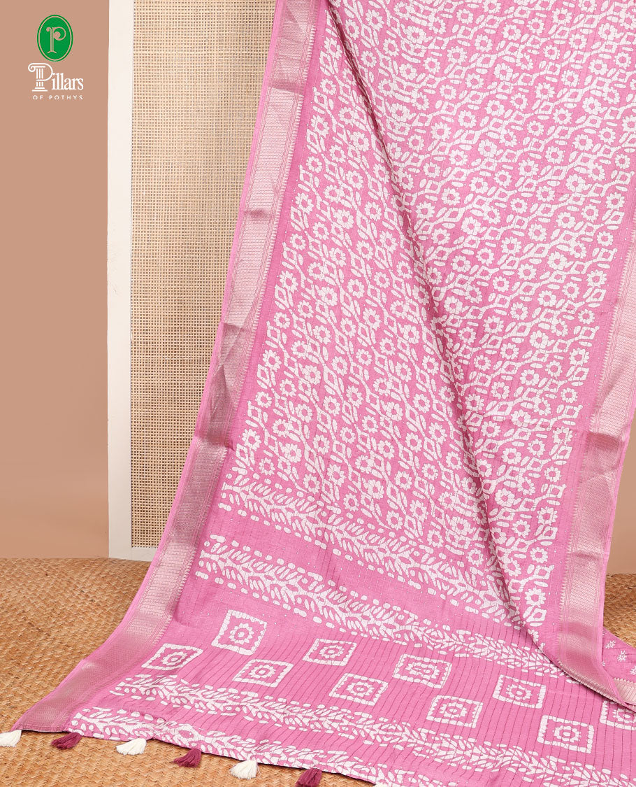 Light pink Batik print, sequins embroidery dola silk saree with gold zari jacquard border & pathick printed, sequins pallu along with pathick printed blouse