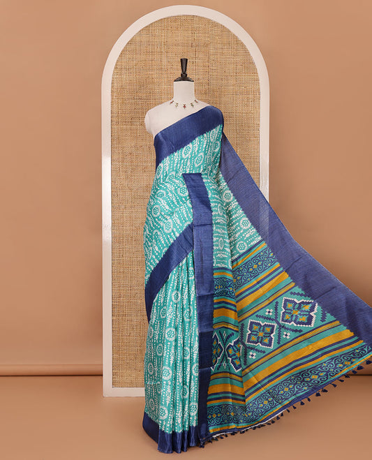 Rama green batik-style printed khadi cotton saree, contrast plain border, patola printed pallu & contrast plain blouse