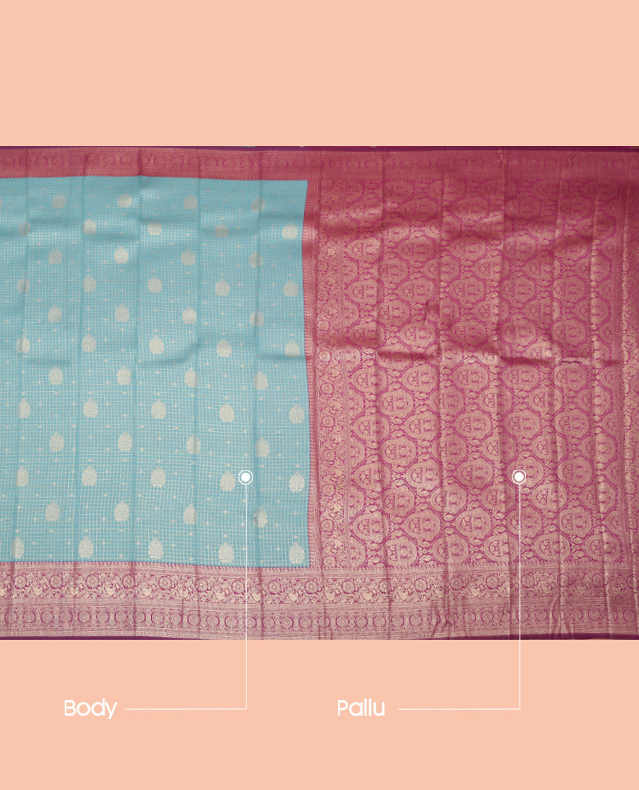 Blue Litchi Saree, Bedecked with Zari Buttas and Checks, a Contrast Traditional Zari Border, Grand Pallu, and a Contrast Blouse