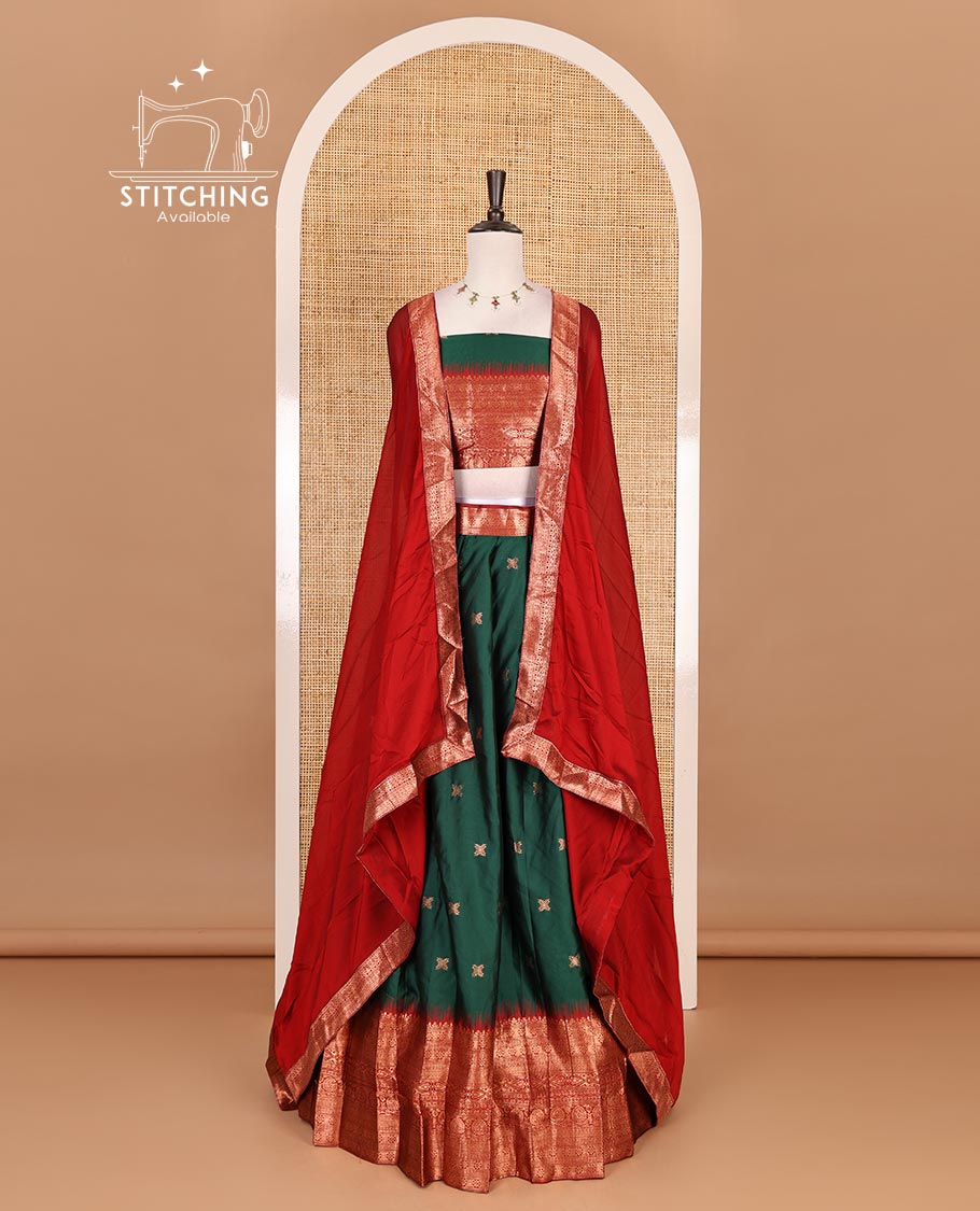 Green taffeta silk half saree, zari buttas with contrast maroon traditional zari border skirt, matching zari design blouse, and contrast plain zari border syska georgette dhavani