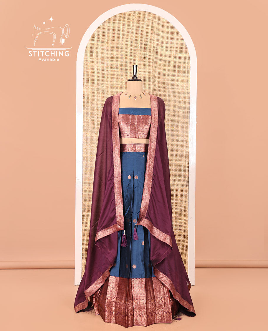 Blue and Purple Semi-Banarasi Half-Saree, Accentuated with Zari Buttas on Its Skirt, Complemented by a Contrast Traditional Zari-Design Border, Paired with a Matching Blouse, and a Contrast Satin Georgette Zari-Bordered Dhavani