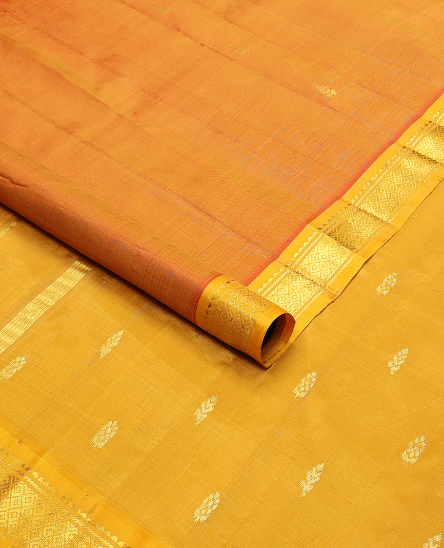 Orange floral buttas kancheepuram silk saree with contrast border of zari design border & floral design pallu