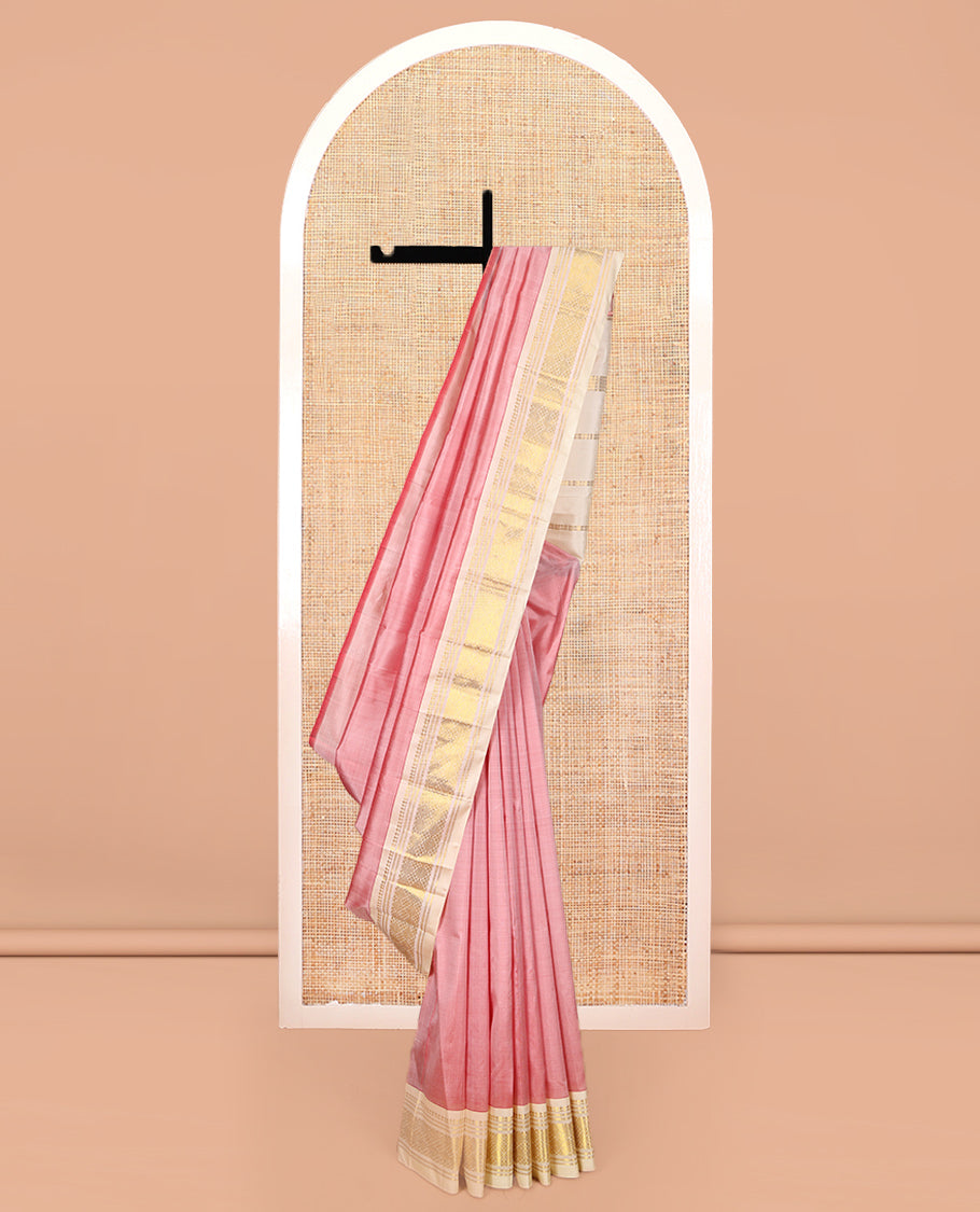 Pink Kanchipuram Silk Saree Featuring Zari Buttas, Complemented by a Contrast One-Sided Border of Panner Sombu, Banaras, and Jaal Design, Zari Design Pallu, and No Blouse