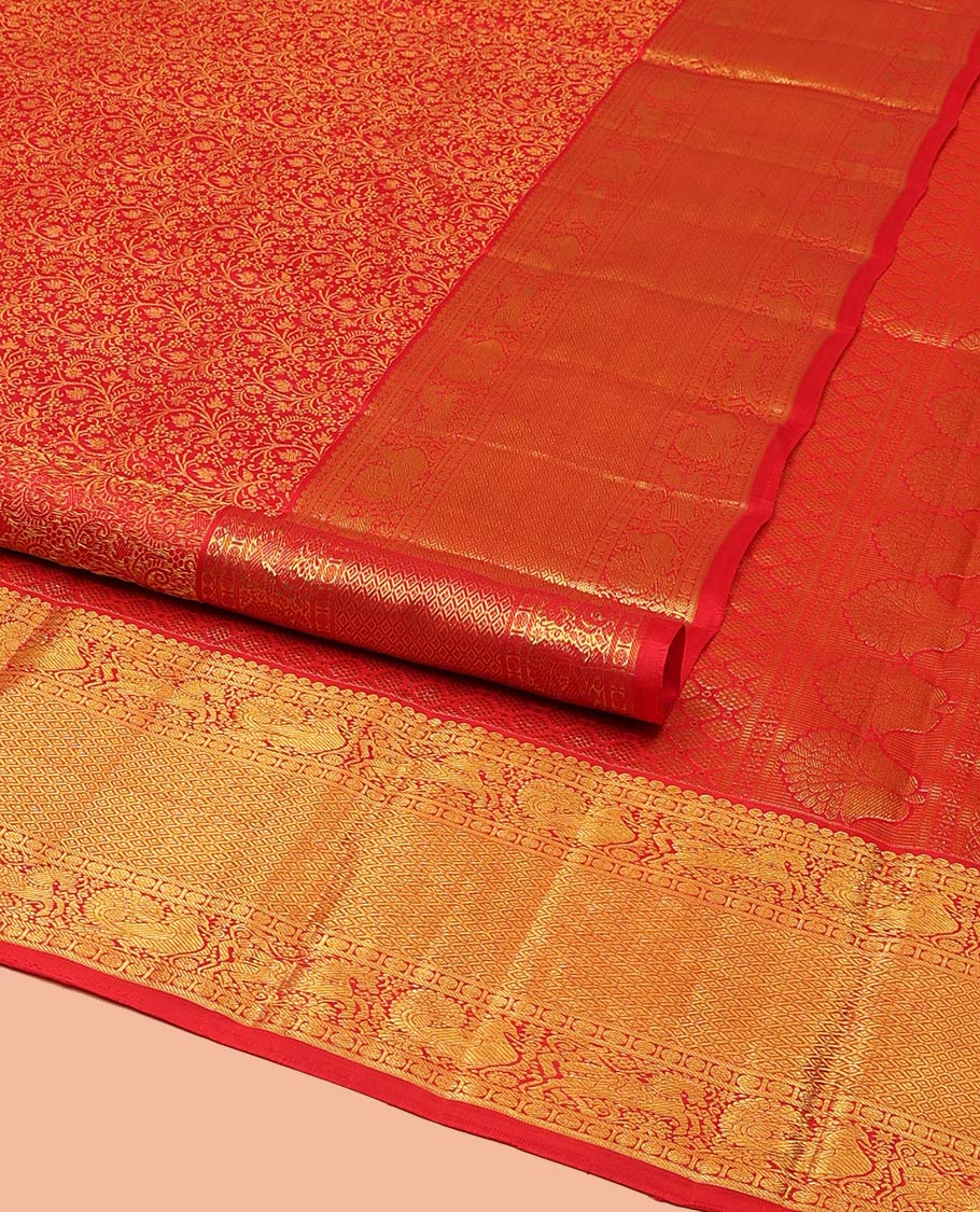 Red Kanchipuram Wedding Silk Saree, Beautifully Bedecked with Floral Jacquard Design on Its Body, Highlighted by a Zari Border of Salngai, Rudraksham, Mayil, Kuthirai, and Jaal Designs, Grand Jaal Pallu, and Paired with a Matching Blouse