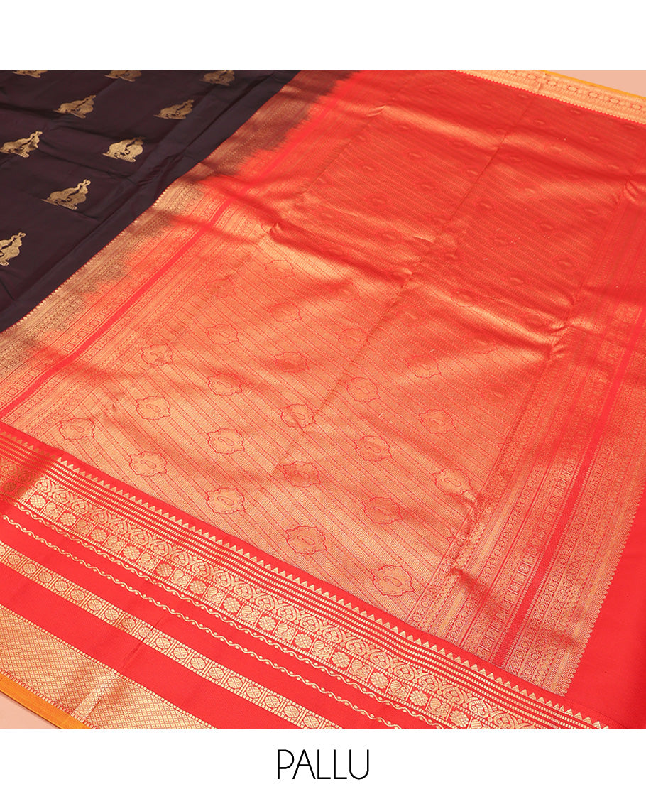 Brown Vasundhara Lite Silk Mix Saree, Delicately Woven with Yaanai Buttas, Complemented by Contrast Border of Rekku, Muthu, Jada Nagam, Laddu Kamalam, Mayil, Rudraksham, and Mayil Kann Designs, Grand Pallu and Paired with a Contrast Blouse