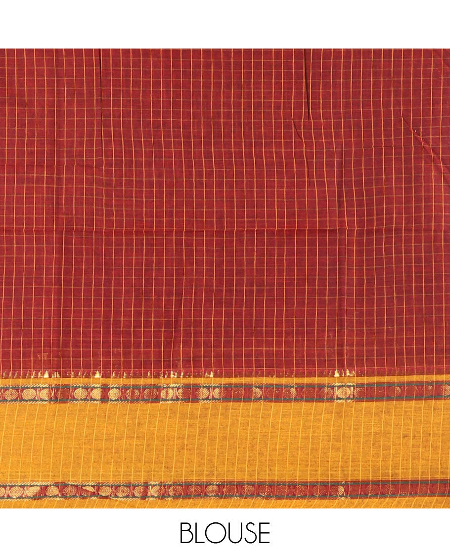Red half-saree, checked with contrast traditional motifs zari bordered skirt, matching blouse and a contrast zari border plain dhavani