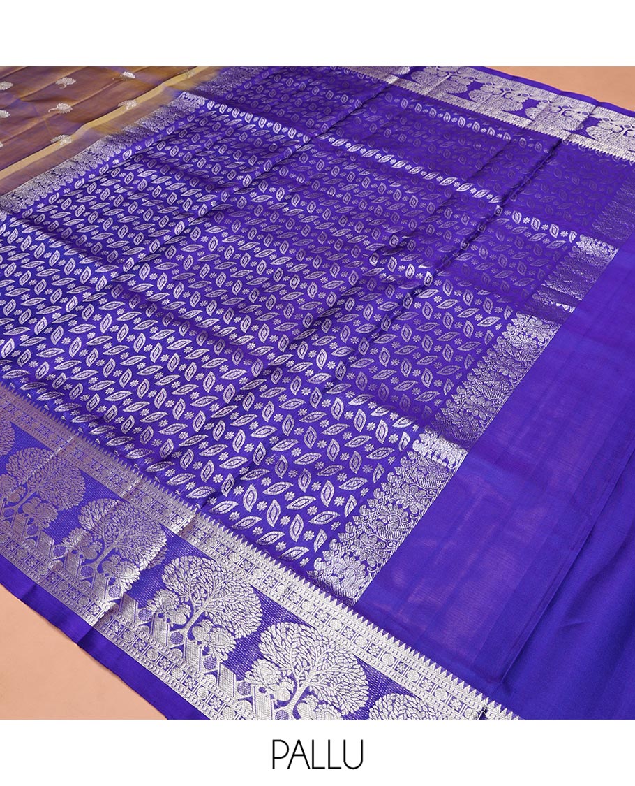 Green Venkatagiri Silk Saree, Enriched with Zari Buttas All Over Its Body, Complemented by a Contrast Traditional Zari Border of Tree Designs, Pallu Steeped with Leaf Designs, and Paired with a Contrast Blouse